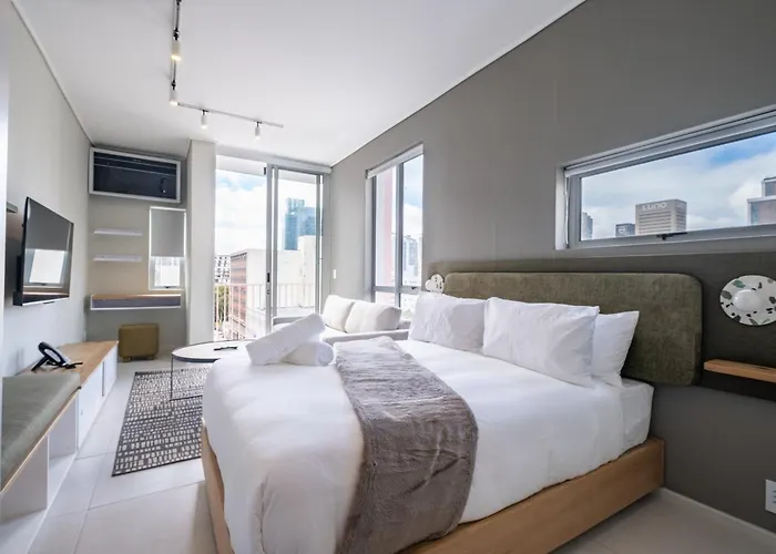 The Rose 406: Central City Studio Apartment